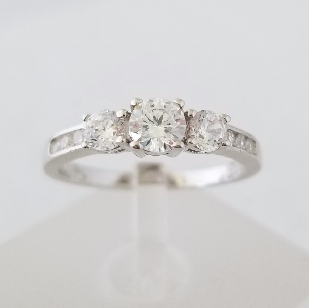 Sterling 3 Stone Ring with channel set side CZs